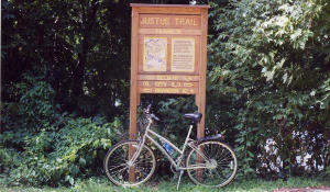 Samuel Justus Trail head distance sign.
